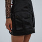 Jasmine Utility Mini Skirt In Black