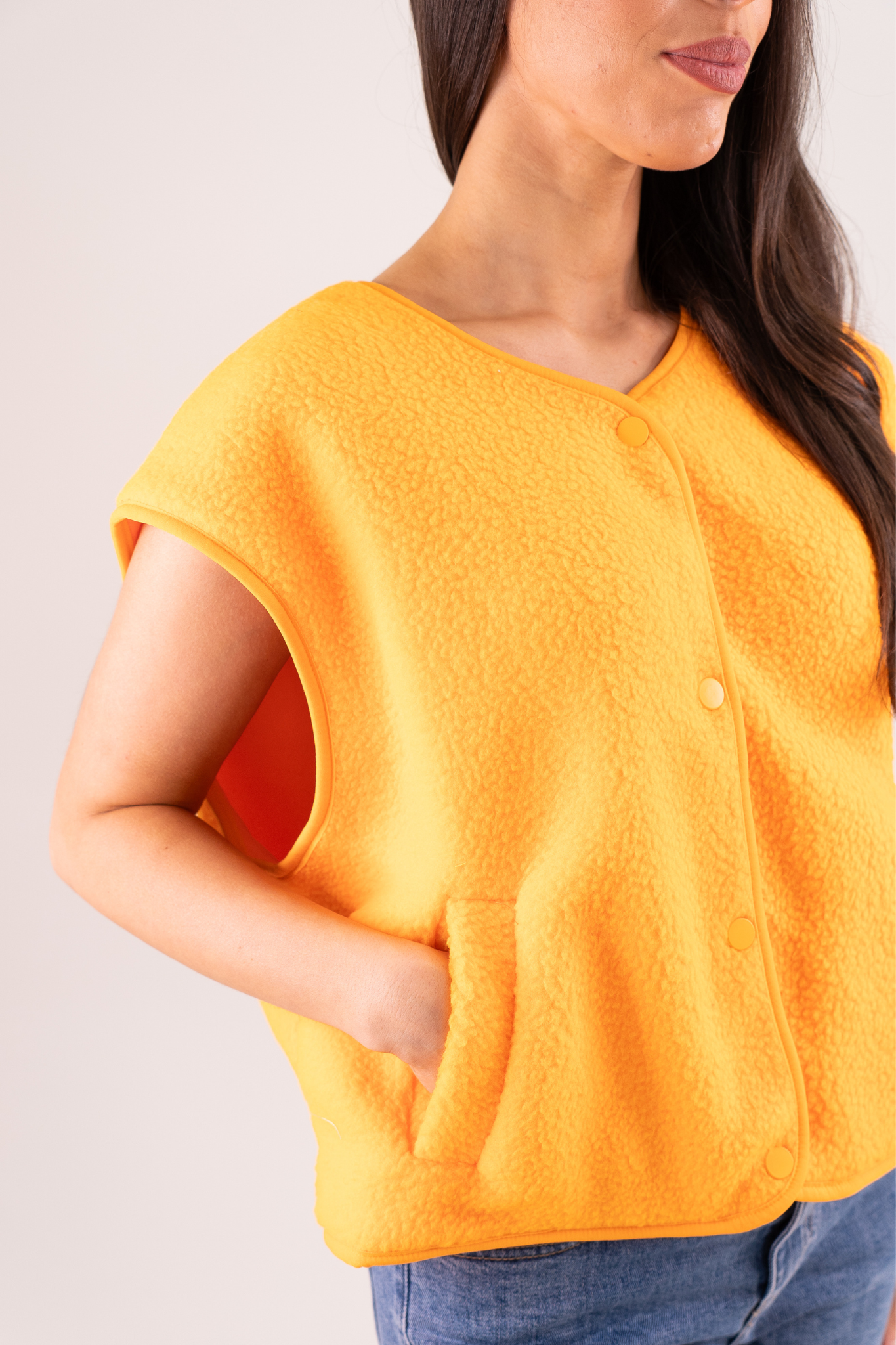 Kendra Fleece Waistcoat In Orange