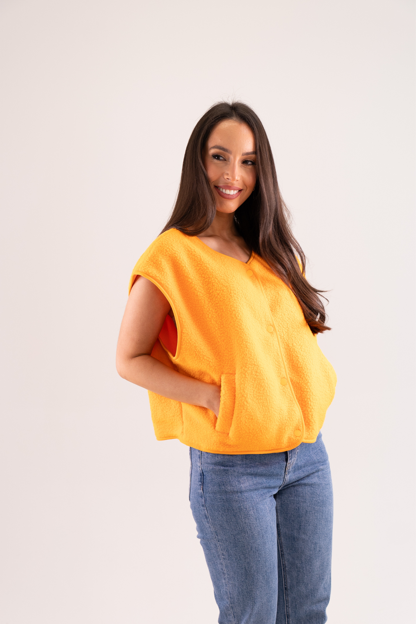 Kendra Fleece Waistcoat In Orange