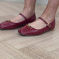 Ellen Gold Buckle Flats In Red