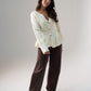 Ally Peplum Cardigan In Cream