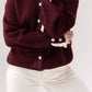 Belle Polka Dot Ruffle Cardigan In Bordeaux