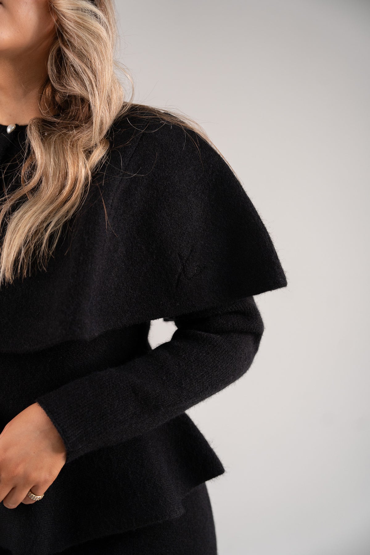 Love Laura Knit Cape With Pearls In Black