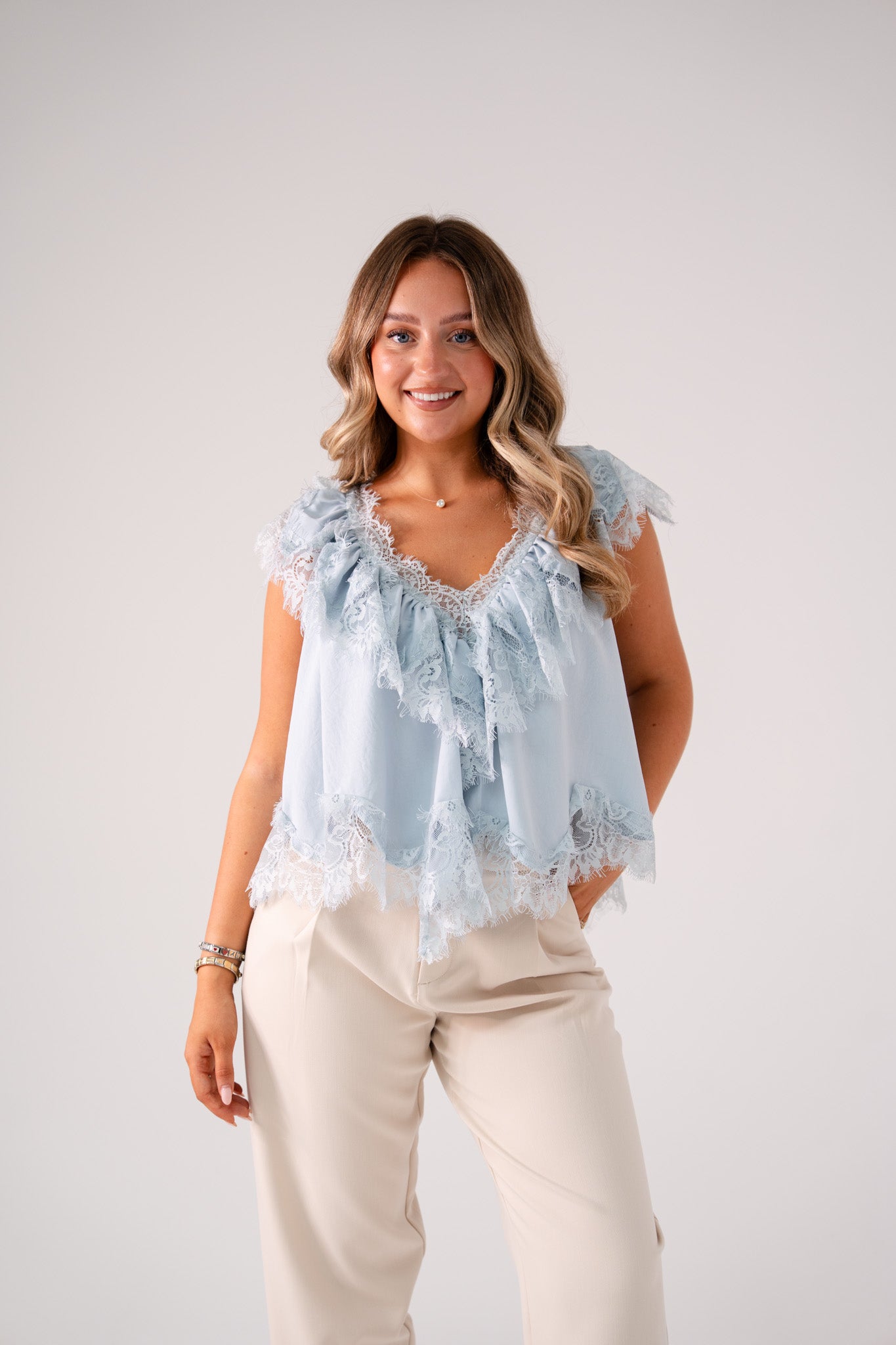 Elsa Sleeveless Ruffle Top In Blue