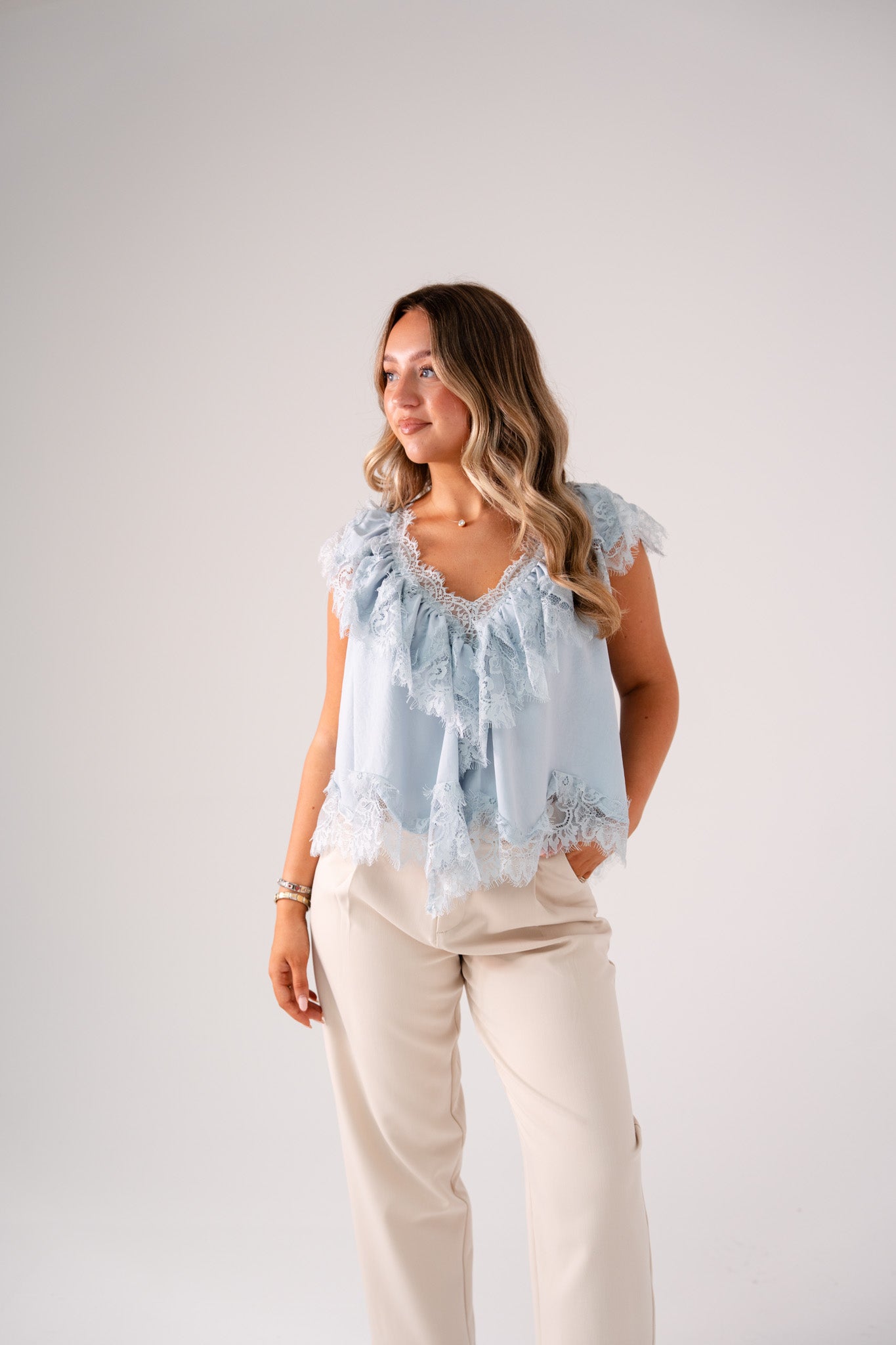 Elsa Sleeveless Ruffle Top In Blue