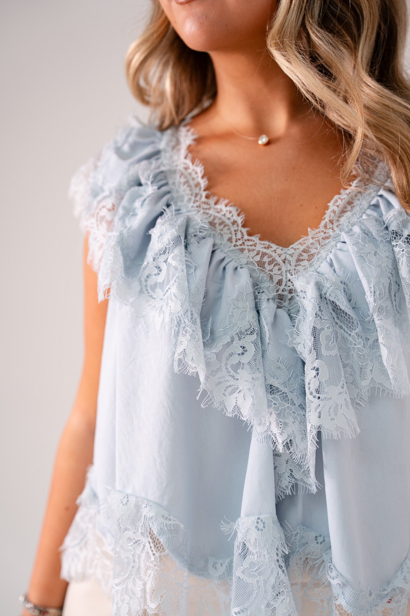 Elsa Sleeveless Ruffle Top In Blue