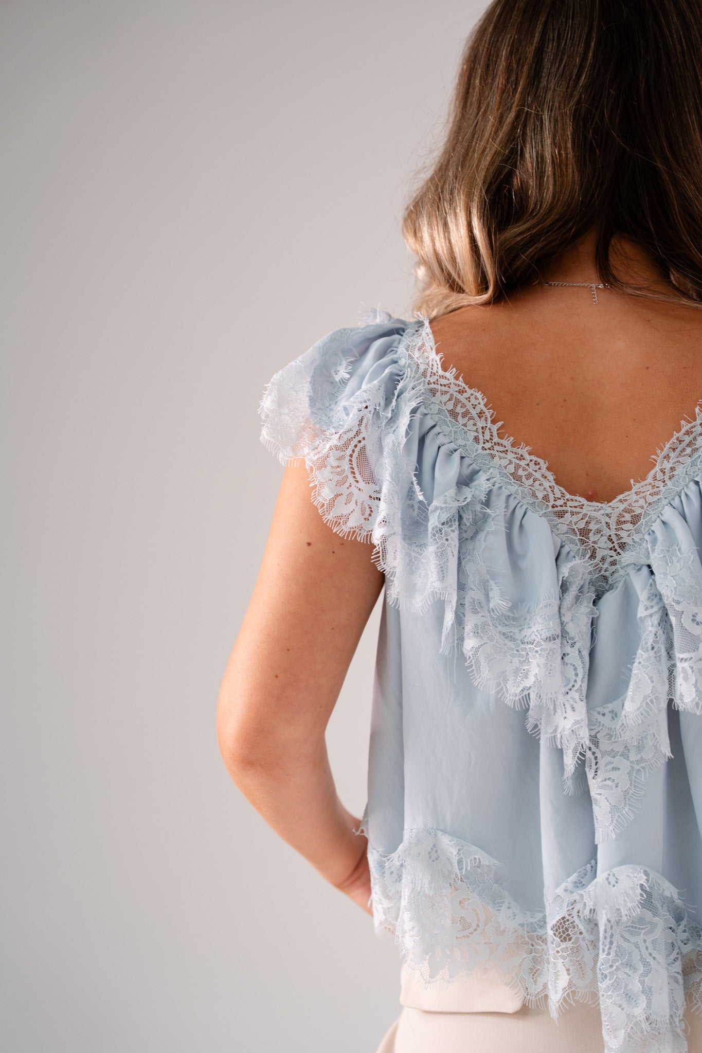 Elsa Sleeveless Ruffle Top In Blue