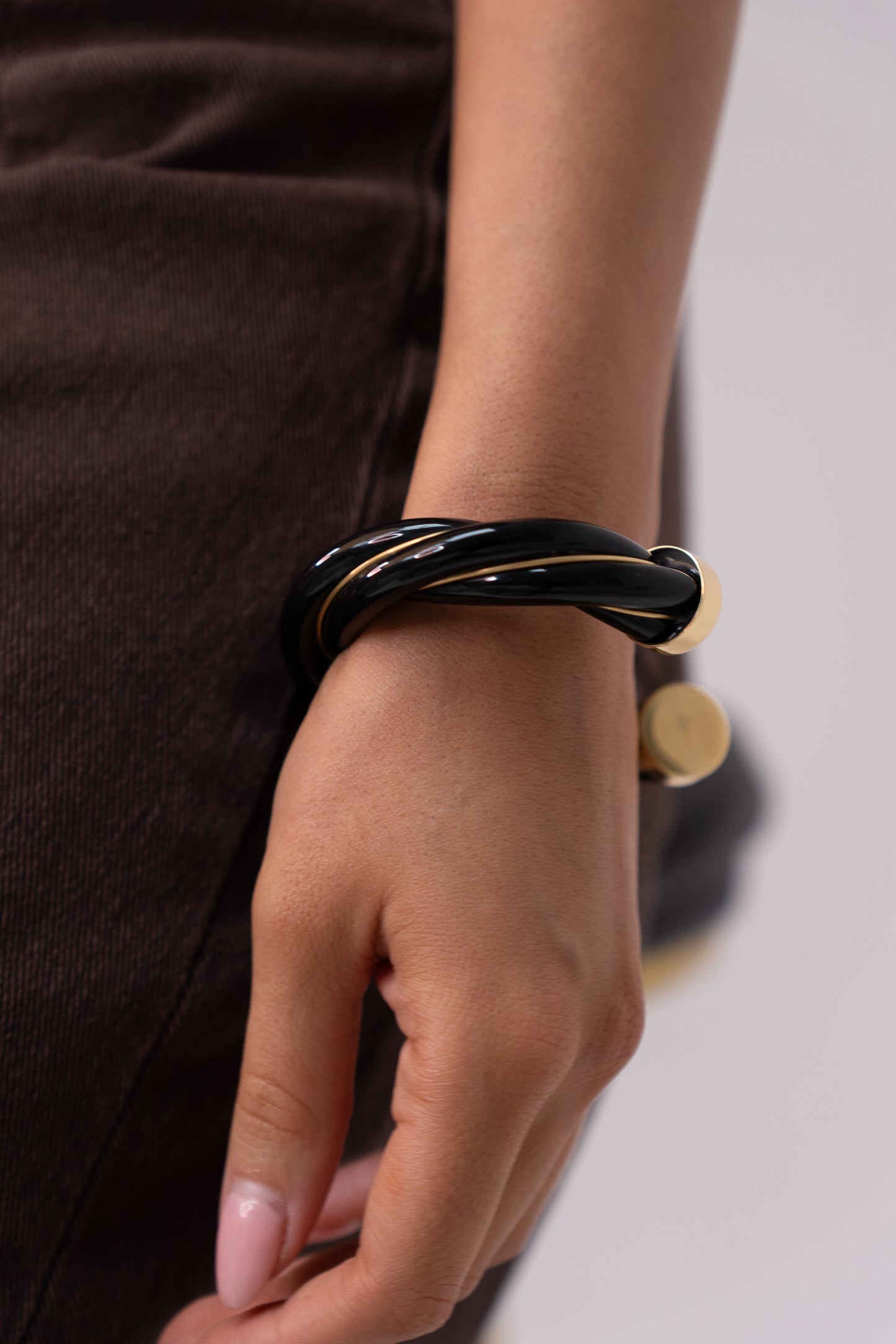 Ruby Twist Bangle In Black