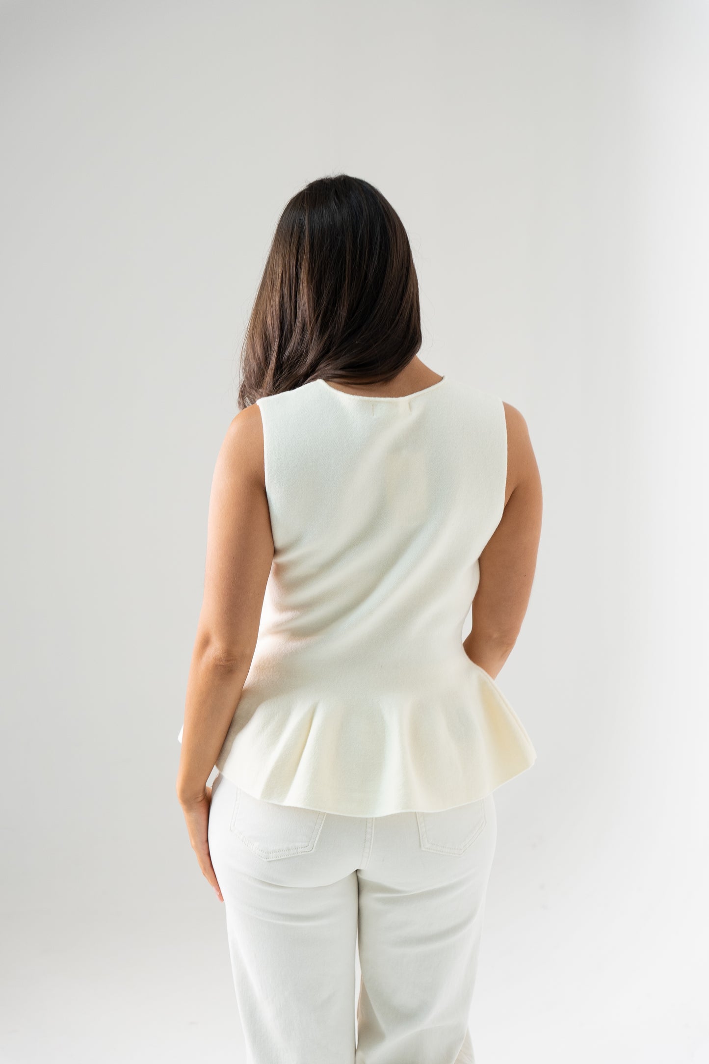 Kendra Split Neck Peplum Waistcoat In Cream
