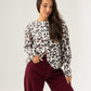 Kendra Button Back Jumper In Leopard Print