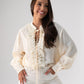 Kendra Tie Neck Ruffle Blouse In Cream