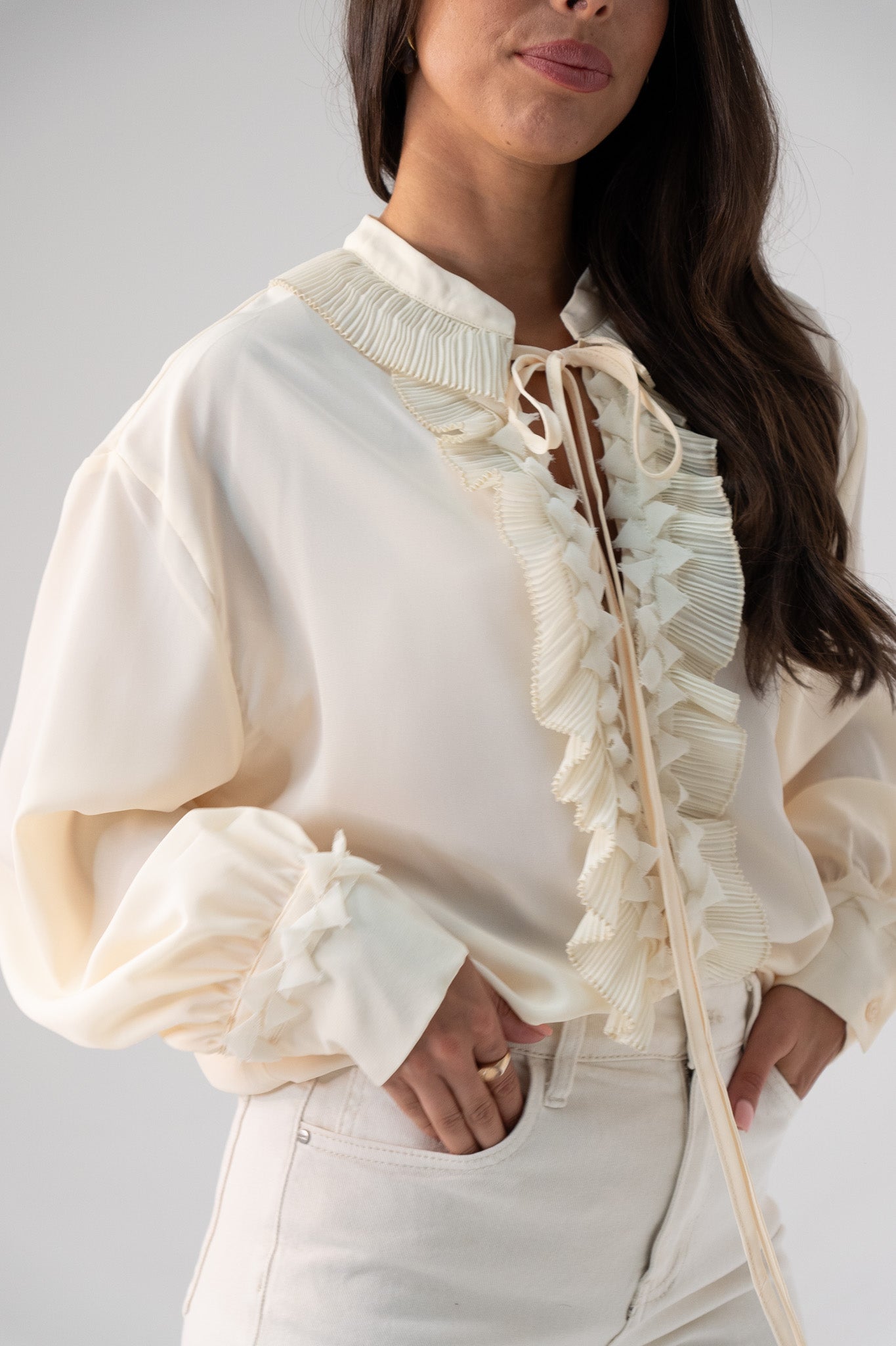 Kendra Tie Neck Ruffle Blouse In Cream