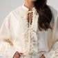 Kendra Tie Neck Ruffle Blouse In Cream