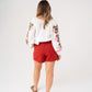 Kiera Belted Shorts In Red