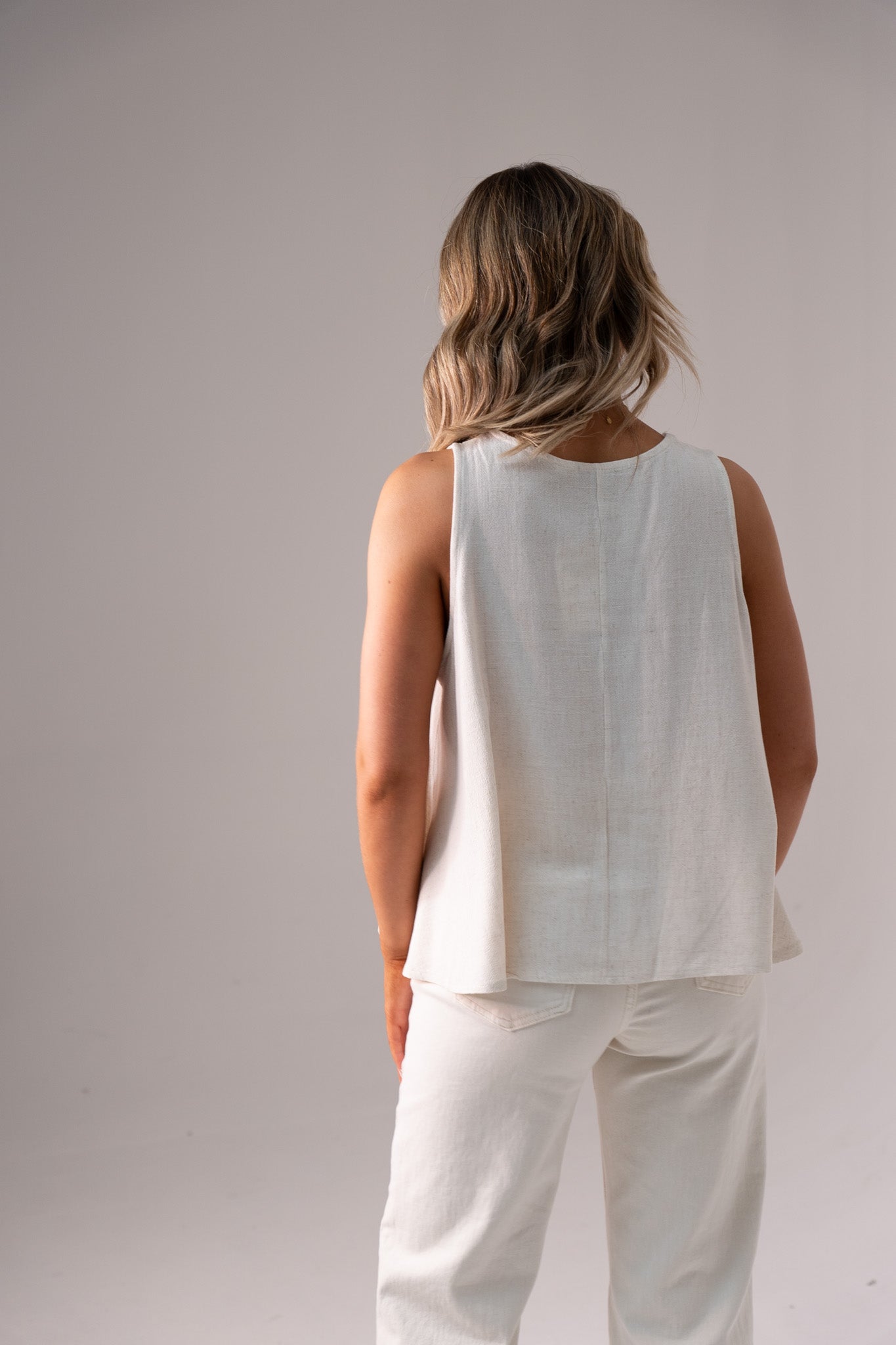 Paige Asymmetric Hem Top In Neutral