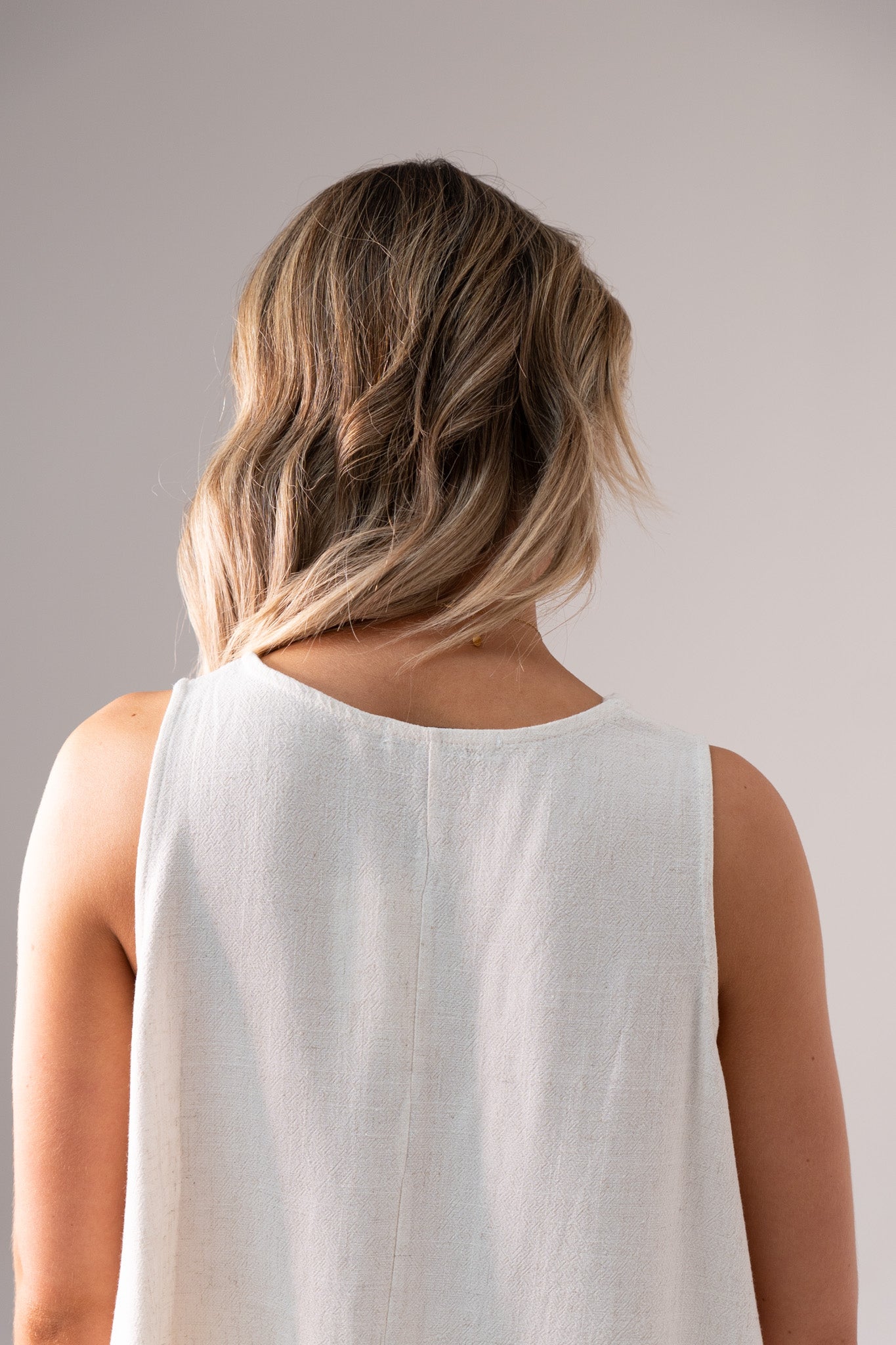 Paige Asymmetric Hem Top In Neutral