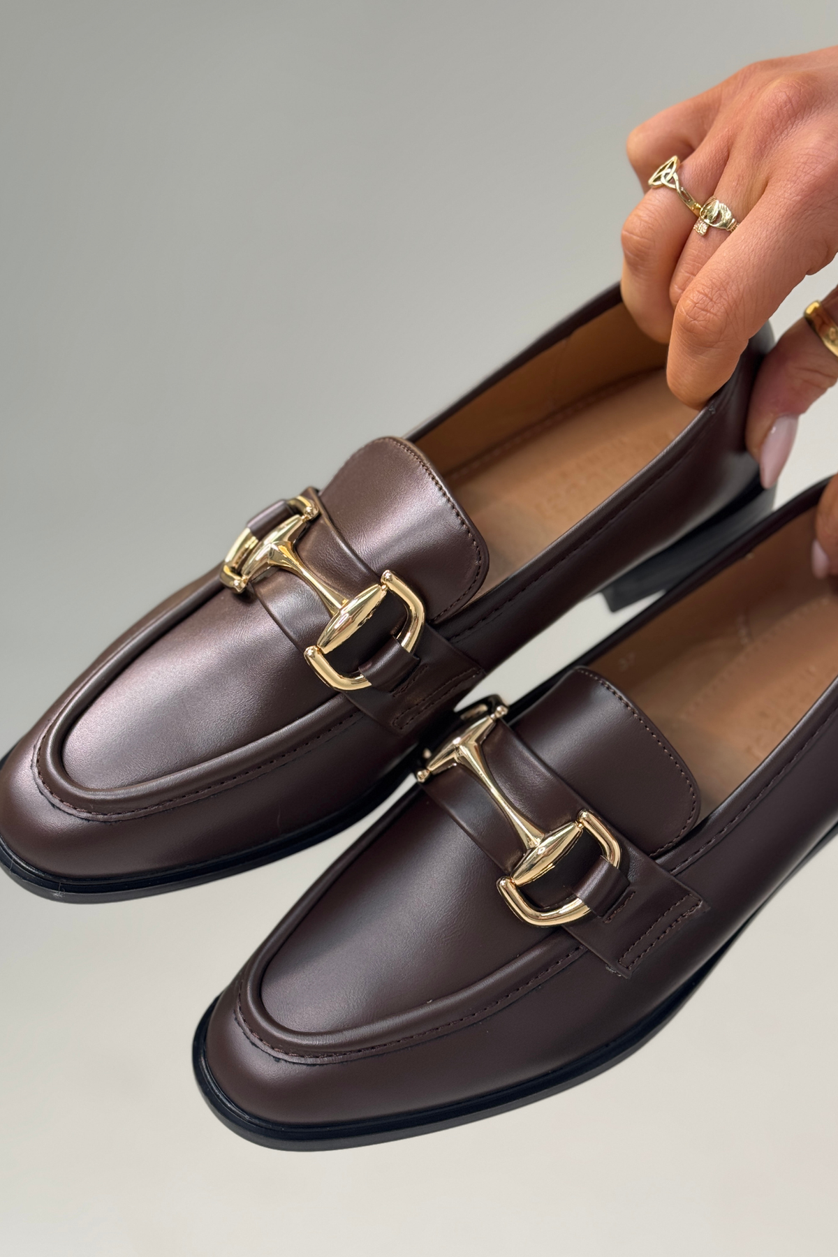 Lauren Buckle Faux Leather Loafer In Chocolate