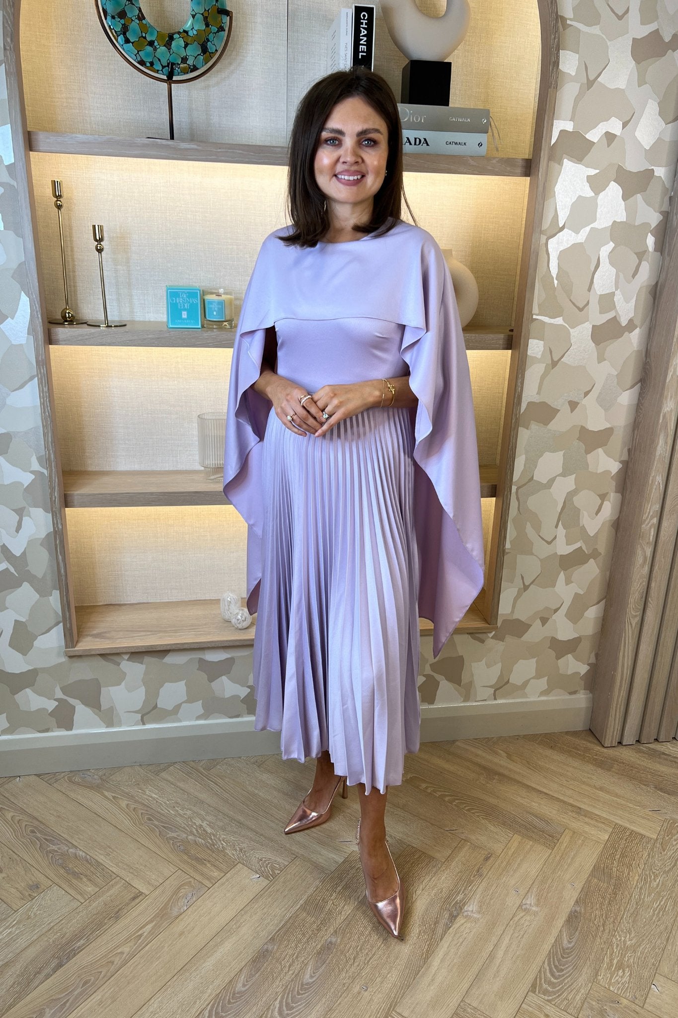 Celine Cape Detail Pleated Dress In Lilac - The Walk in Wardrobe